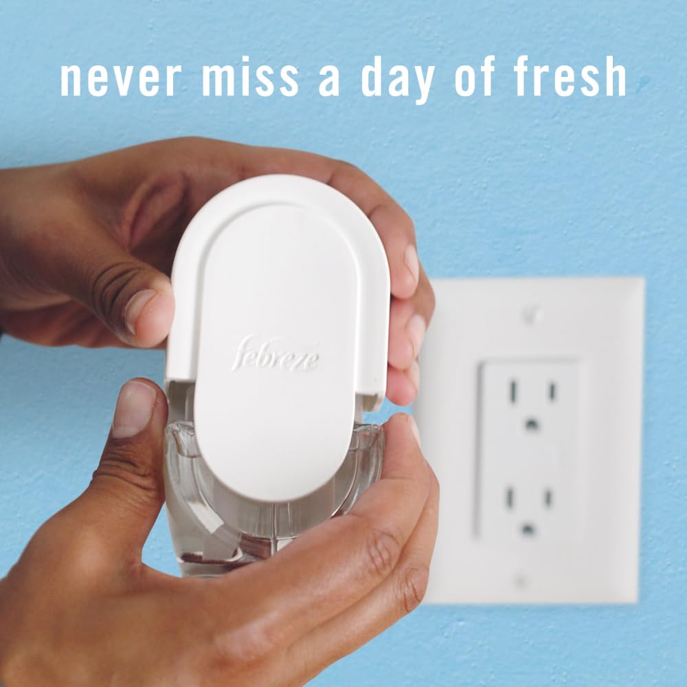 Febreze Plug in Air Freshener, Odor-Fighting Scented Oil Starter Kit, Air Fresheners for Home and Bathroom and Kitchen, Long Lasting for Strong Odors, Ocean Scent, Warmer + 2 Refill
