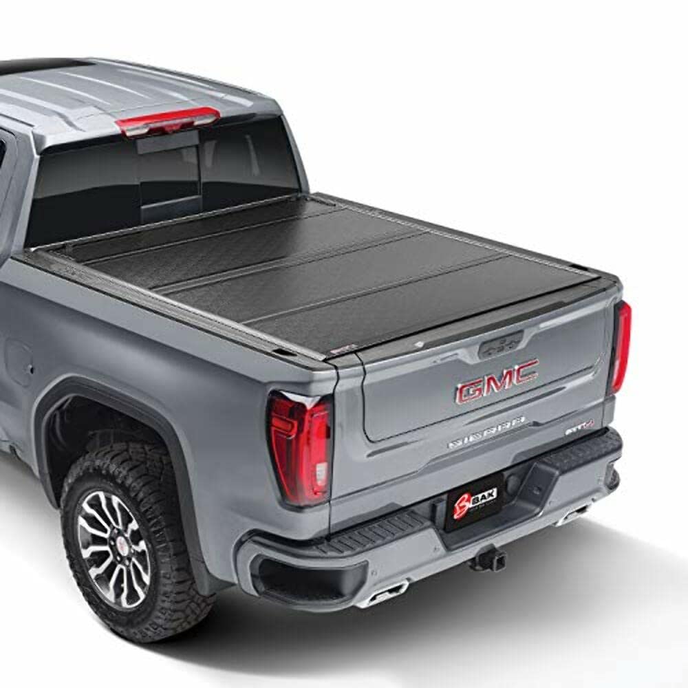 RealTruck BAK BAKFlip F1 Hard Folding Truck Bed Tonneau Cover | 772133 | Fits 2020-2026 Chevy/GMC Silverado/Sierra 2500/3500HD 6' 10" Bed (82.2")