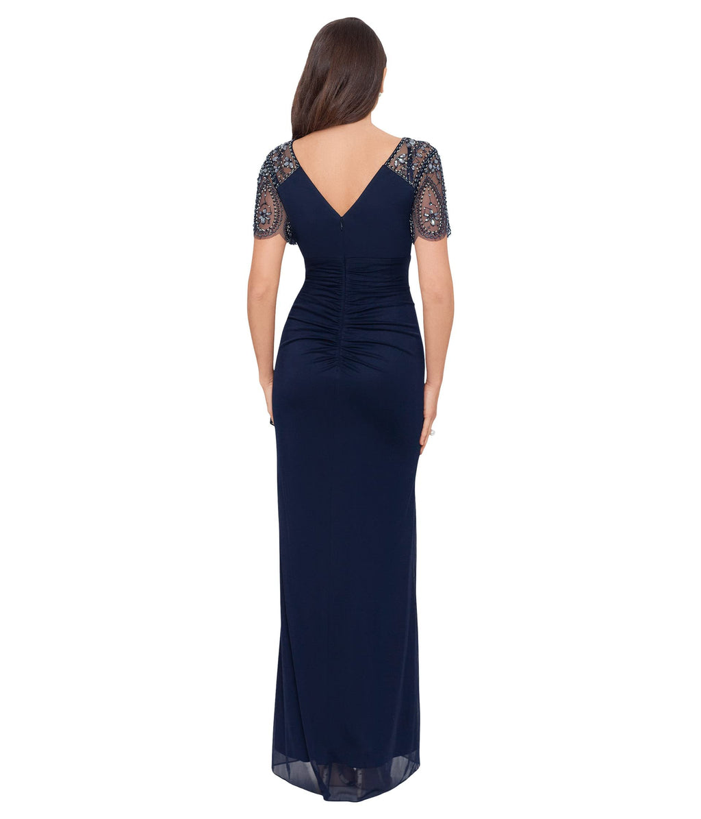 Xscape Floor Length Jersey Knit Evening Gown with V-Neckline, Beaded Flutter Sleeves and Ruched Draping