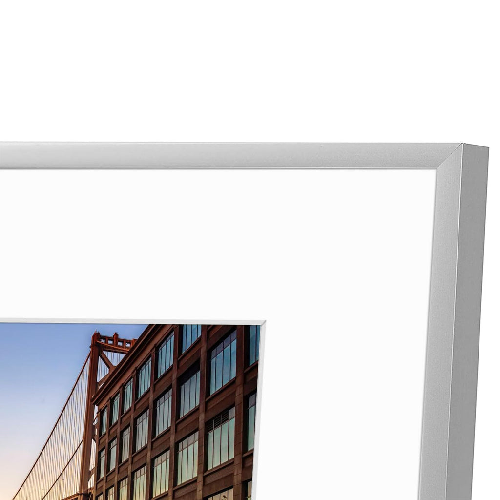 Frametory, 6x8 Aluminum Picture Frame - 6 x 8 Black Frame with Removable Mat for 5 x 7 Photo - 6 by 8 Durable Metal Frame with Real Glass - Sawtooth Hanger for Easy Wall Display - 1 Pack