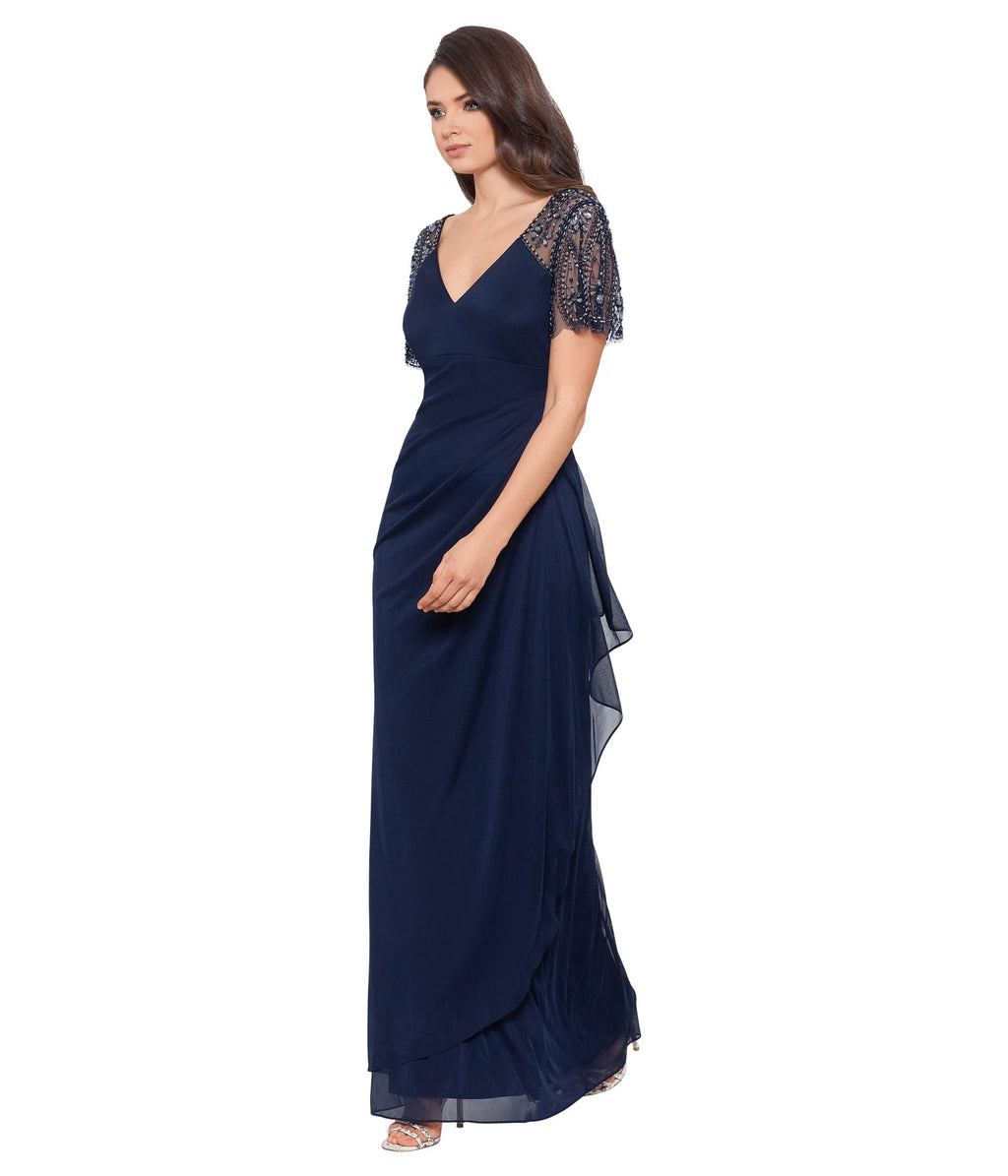 Xscape Floor Length Jersey Knit Evening Gown with V-Neckline, Beaded Flutter Sleeves and Ruched Draping