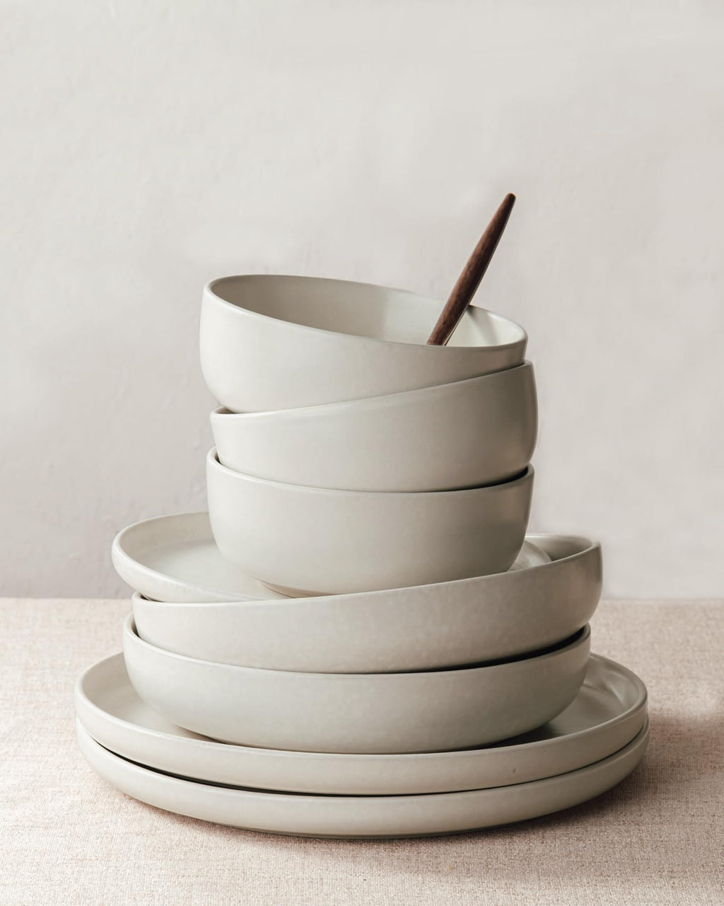 Famiware Pluto Stoneware Dinnerware Sets, 12-Piece Double Reactive Glaze Plates and Bowls Sets, Dishware Sets for Everyday & Formal Dining, Irregular Edge Dishes, Service for 4, Matte Beige White