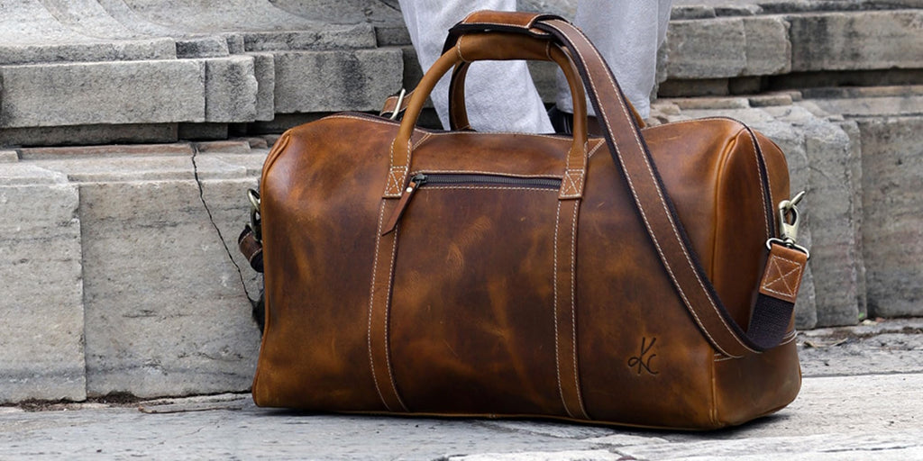 KomalC Leather Duffle Bags for Men and Women Travel Overnight Weekend sports bag holdall Gym Duffel for Men (Dark Tan, 20 Inch)