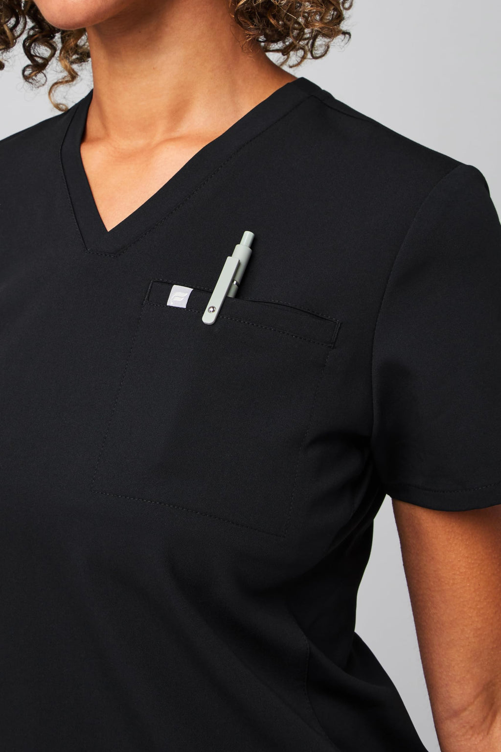 Fabletics Women's Vital 1-Pocket Scrub Top - MotionTech, Wrinkle-Resist, Chest Pocket, Anti-Shrink, Semi-Slim Fit