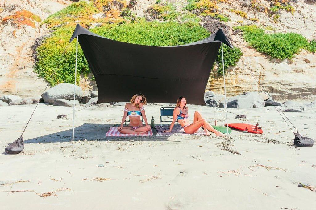 Neso Grande Portable Beach Tent Sun Shelter - Lightweight Beach Shade Canopy - Easy Setup for Family Outings - Patented Reinforced Corners - UPF 50+ Sun Protection - 7ft Tall, 9 x 9ft