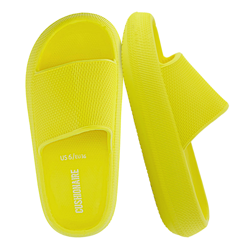 CUSHIONAIRE Feather EVA Slides for Women – Comfortable Slip On Womens Slippers, Indoor Outdoor Shower Shoes, Beach Essential Cloud Slides