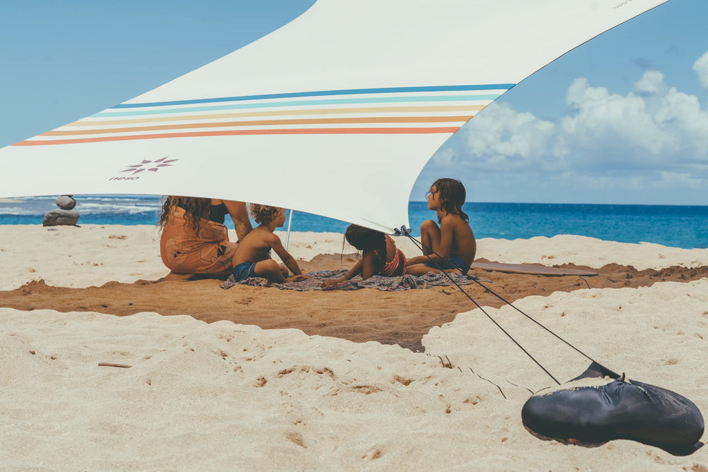 Neso Grande Portable Beach Tent Sun Shelter - Lightweight Beach Shade Canopy - Easy Setup for Family Outings - Patented Reinforced Corners - UPF 50+ Sun Protection - 7ft Tall, 9 x 9ft