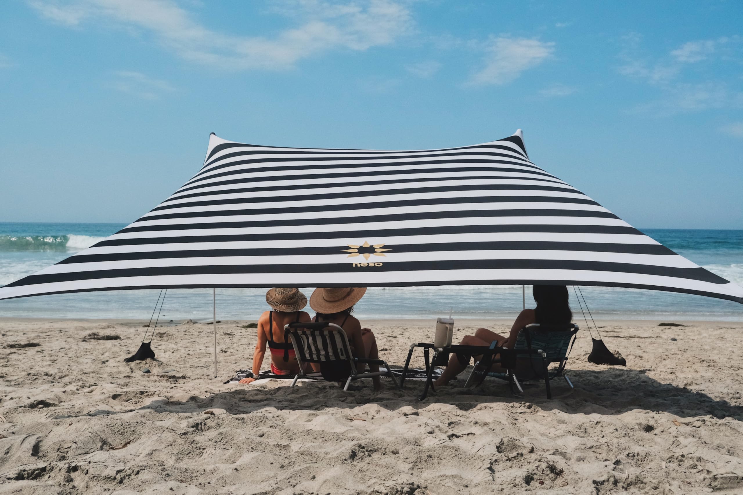 Neso Grande Portable Beach Tent Sun Shelter - Lightweight Beach Shade Canopy - Easy Setup for Family Outings - Patented Reinforced Corners - UPF 50+ Sun Protection - 7ft Tall, 9 x 9ft
