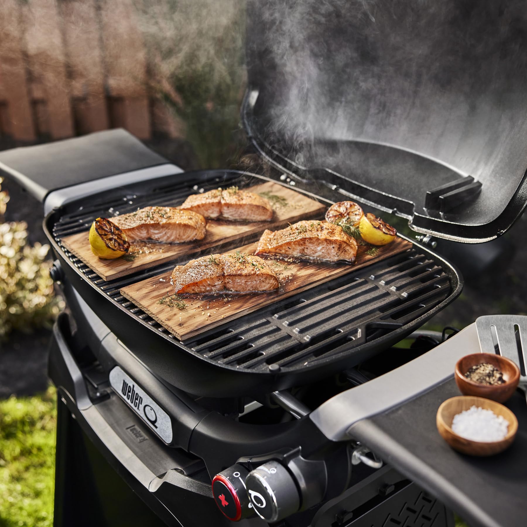 Weber Q 2800N+ Liquid Propane Grill with Stand, Charcoal Grey – Wide 250°–700°F Temp Range with Plus Burner for Searing, Low‑Temp Roasting & High-Dome Lid