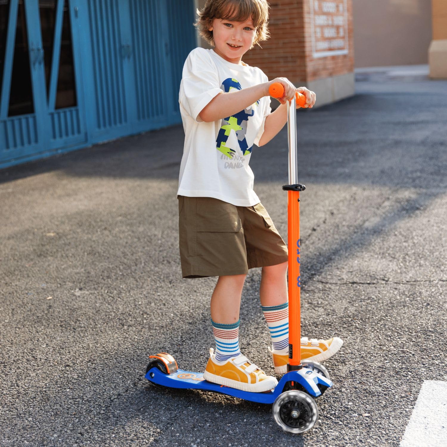 Micro Kickboard | Maxi Foldable LED Kids Scooter for Ages 5-12 | Children up to 110 lbs | 3 Wheel Lean-to-Steer Design | Adjustable T Bar | Smooth Ride, Motion Activated PU LED Wheels | Swiss Design