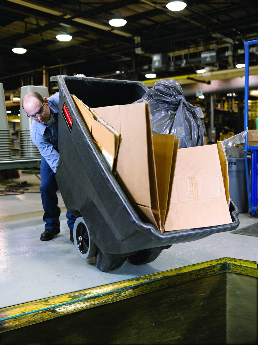 Rubbermaid Commercial Products Tilt Dump Truck, 1 Cubic Yard, 2100 lb Capacity, Black, Heavy Load Capacity with Wheels, Trash Recycling Cart for Office/Warehouse/Facility Management