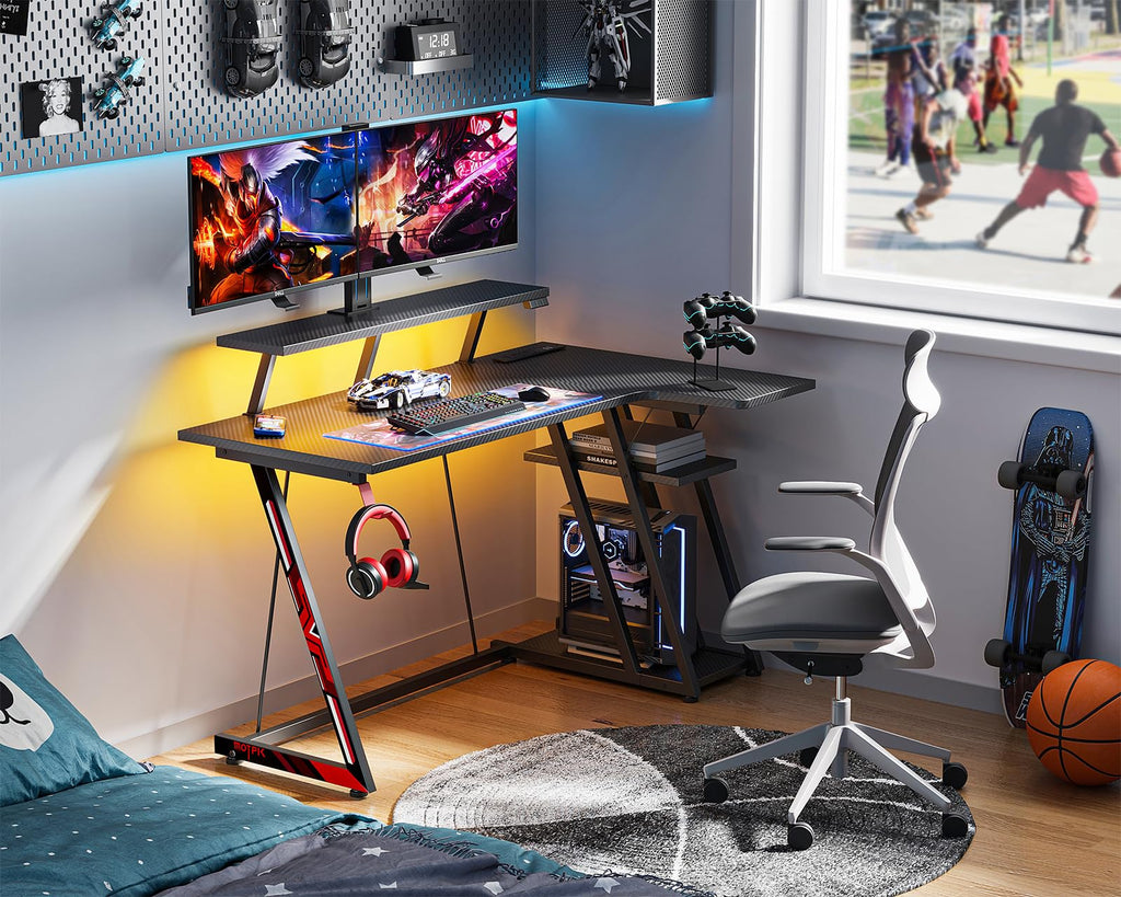 MOTPK Gaming Desk with LED Lights & Power Outlets, 47 Inch L Shaped Computer Desk with Storage Shelf, & Monitor Stand, PC Gaming Table with Carbon Fiber Texture, Black