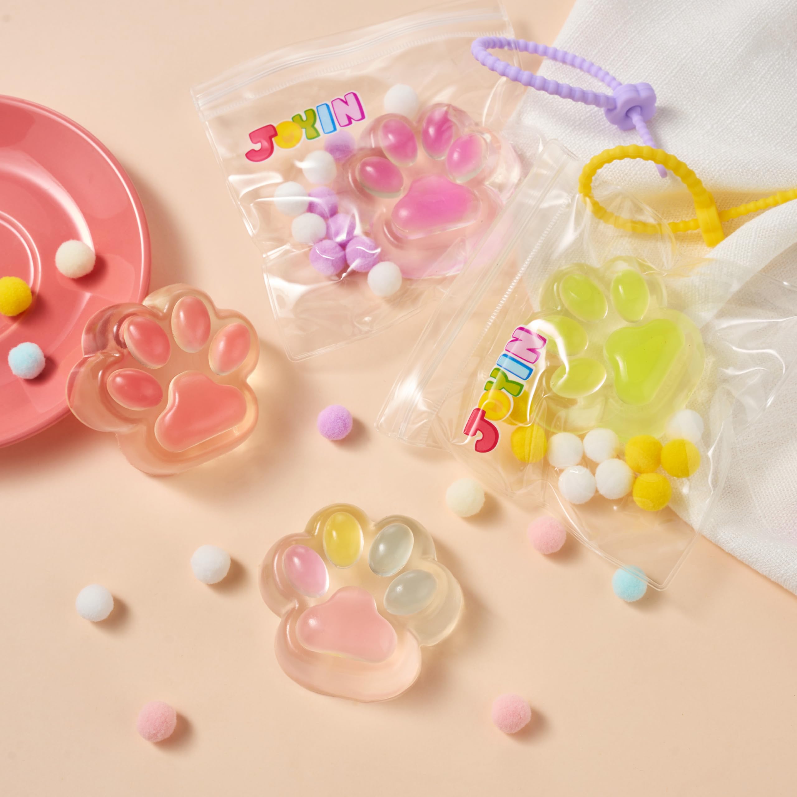 JOYIN 4 Pcs Taba Paw Squeeze Toys, Easter Party Favors & Gifts for Kids Adults, Transparent Cat Paw Fufu Squishy Toys, Soft Paws Sensory Fidgets, Cute Fidget Toys for Stress Relief