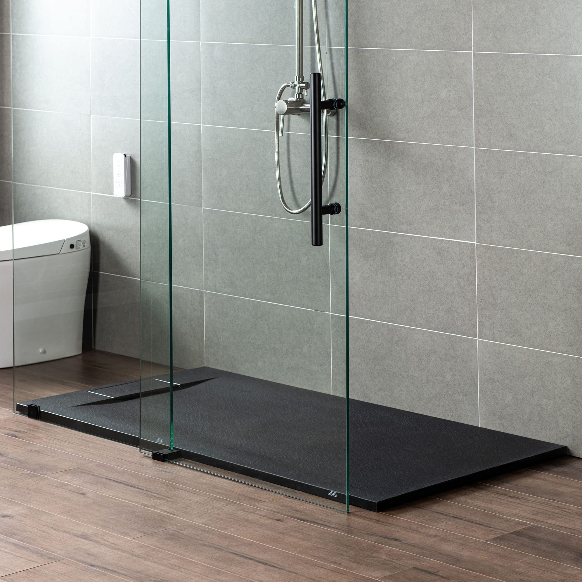 WOODBRIDGE 47.25 in L x 31.5 in W Zero Threshold Shower Base with Center Drain, Decorative Drain Plate, Tile Flange, Wheelchair Access, Low Profile, Black