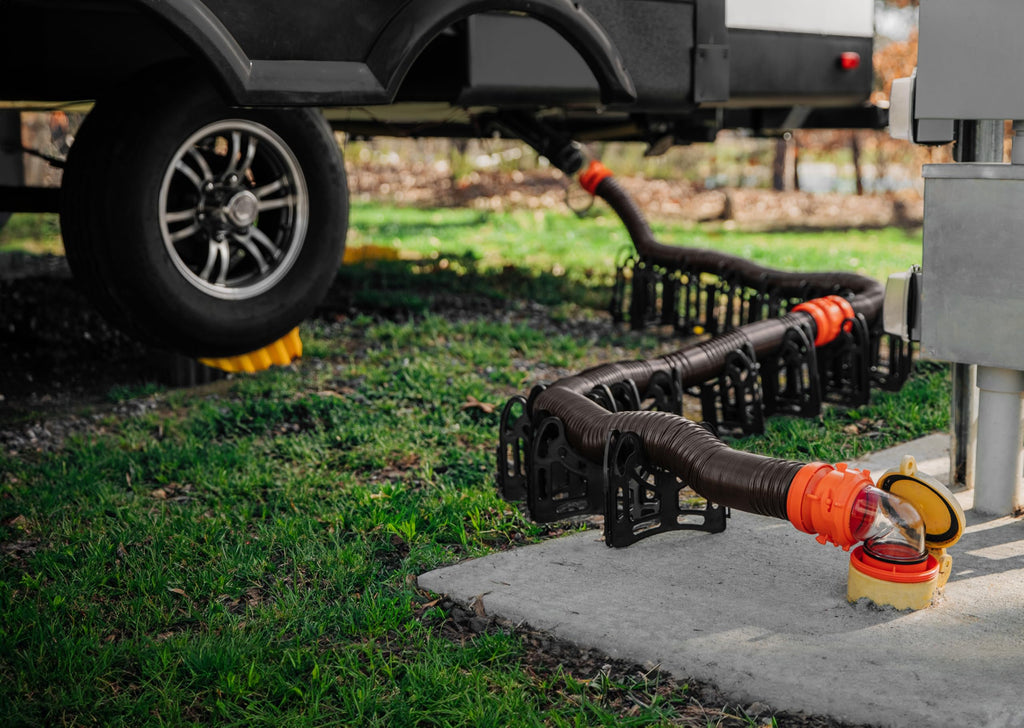 Camco RhinoFLEX 15' RV Sewer Hose Kit — Includes 4-in-1 Adapter, Clear Elbow, & Caps — Connects to 3″ Slip & 3″, 3 1/2″, 4″ NPT Threaded Sewer Connections (39770)