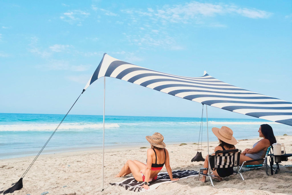 Neso Grande Portable Beach Tent Sun Shelter - Lightweight Beach Shade Canopy - Easy Setup for Family Outings - Patented Reinforced Corners - UPF 50+ Sun Protection - 7ft Tall, 9 x 9ft