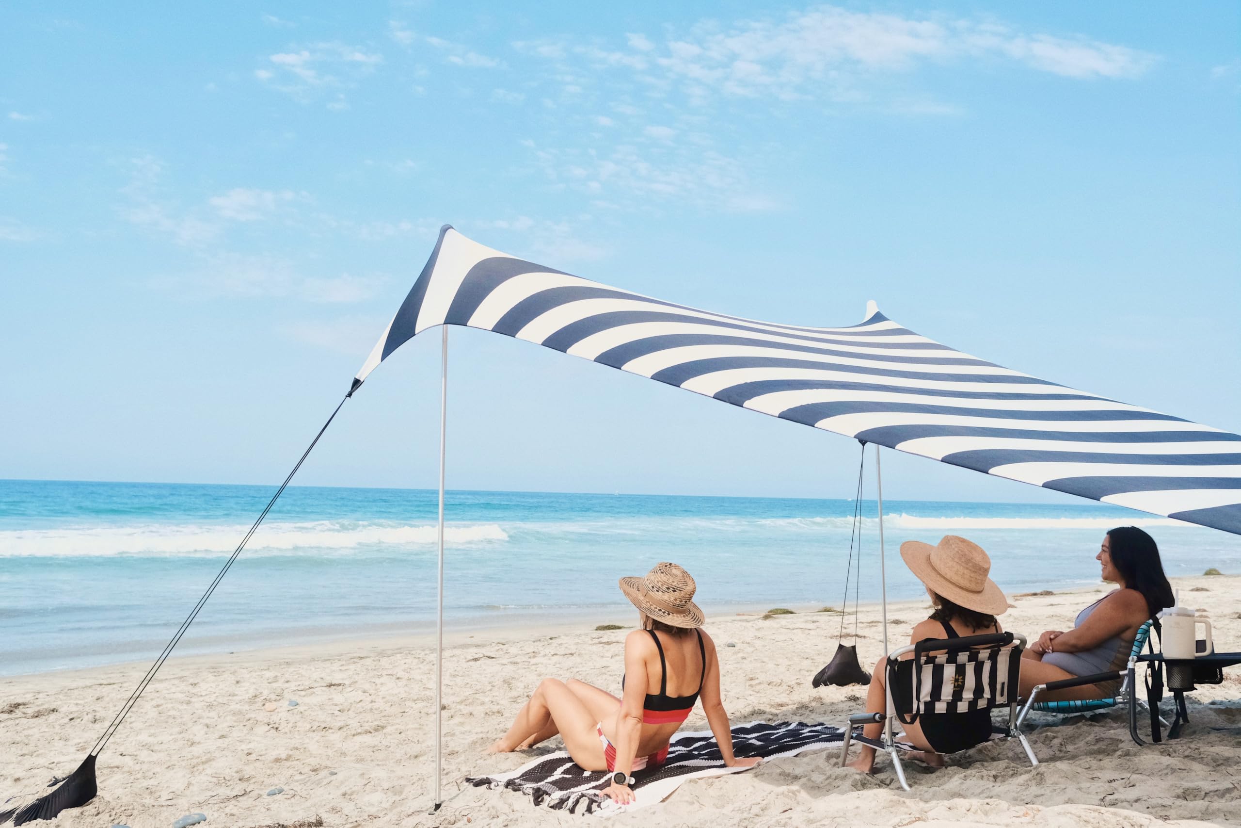 Neso Grande Portable Beach Tent Sun Shelter - Lightweight Beach Shade Canopy - Easy Setup for Family Outings - Patented Reinforced Corners - UPF 50+ Sun Protection - 7ft Tall, 9 x 9ft