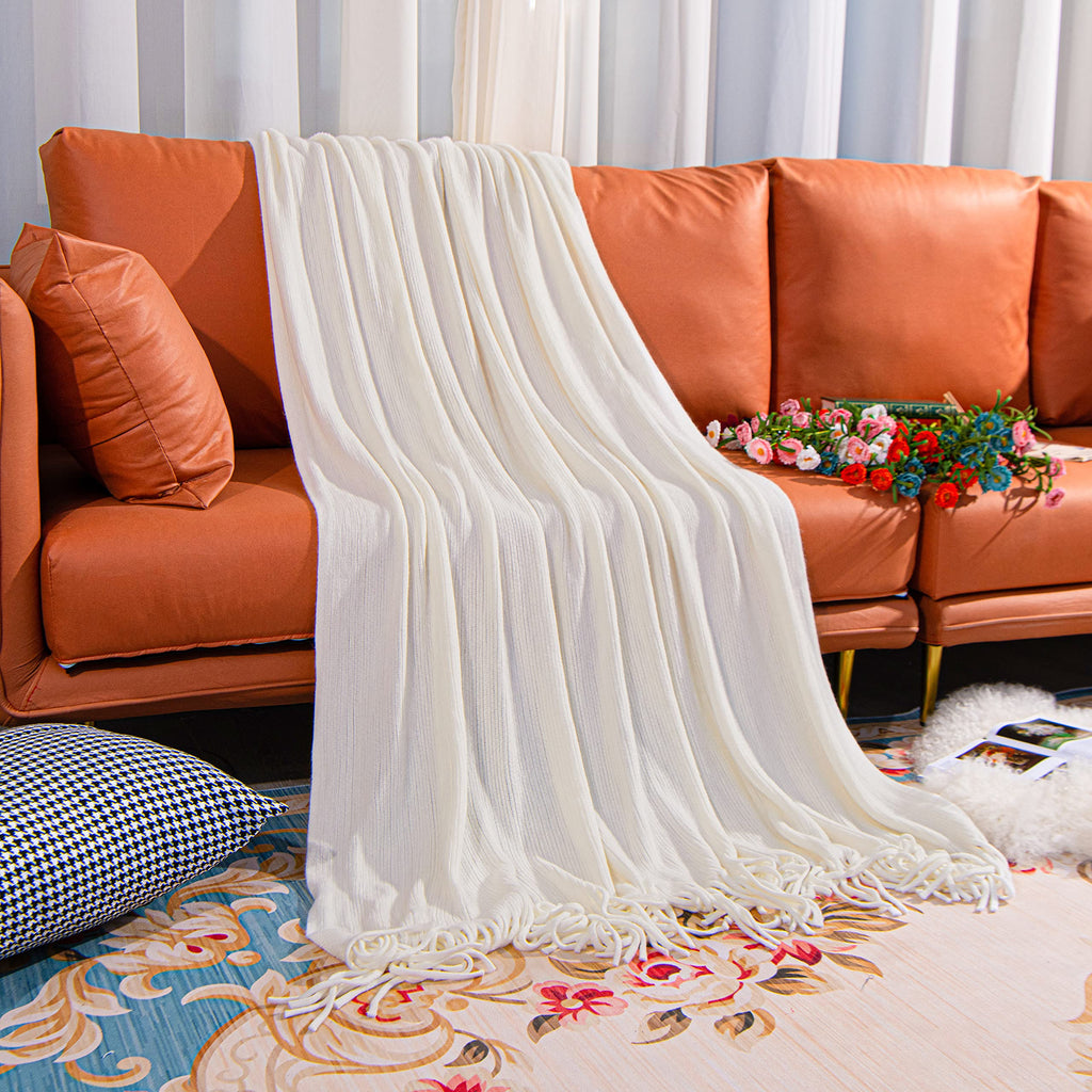NTBAY Acrylic Knitted Throw Blanket, Lightweight and Soft Cozy Decorative Woven Blanket with Tassels for Travel, Couch, Bed, Sofa, 51x67 Inches, Grey Wave