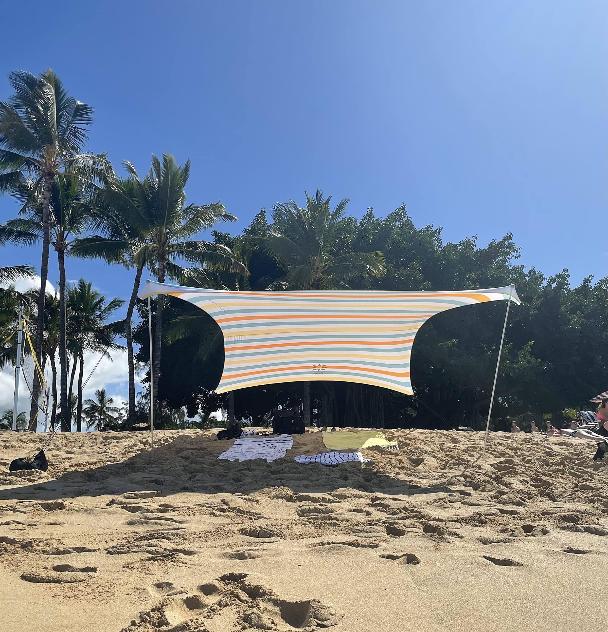 Neso Grande Portable Beach Tent Sun Shelter - Lightweight Beach Shade Canopy - Easy Setup for Family Outings - Patented Reinforced Corners - UPF 50+ Sun Protection - 7ft Tall, 9 x 9ft